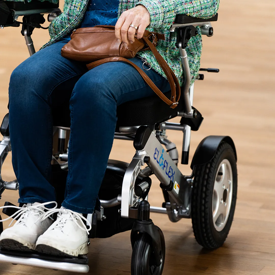Eloflex foldable power wheelchair at the airport